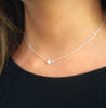 women necklace in silver with a minimalist style