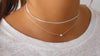 silver necklace set with a choker 